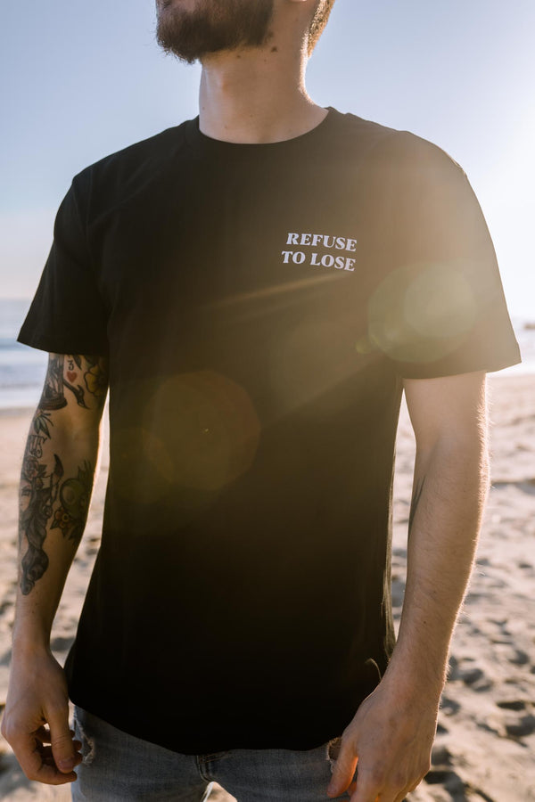 Nothing Happens Overnight Tee - Black